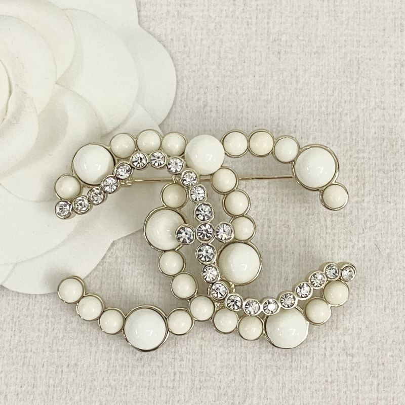 Ch*el brooches